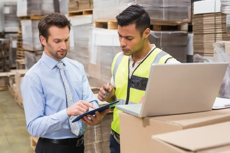 A dedicated Alpha Trucking employee manages freight in their Adelaide warehouse, highlighting the company's commitment.